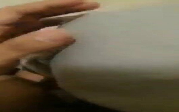 Pekerjaan pukulan dalam jilbab